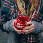 woman holding a mug